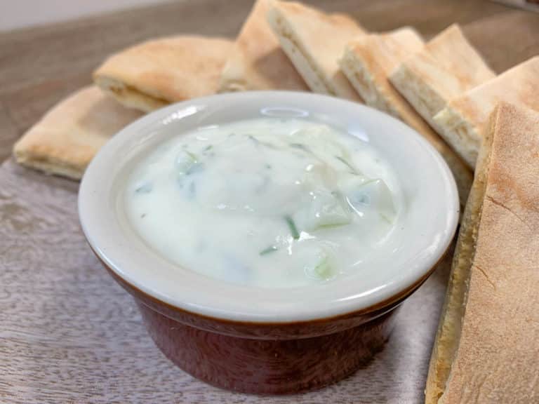 tzatziki sauce with while wheat pita bread