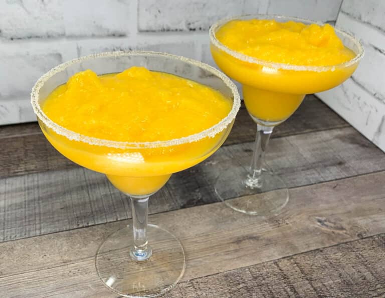 two glasses of mango margaritas