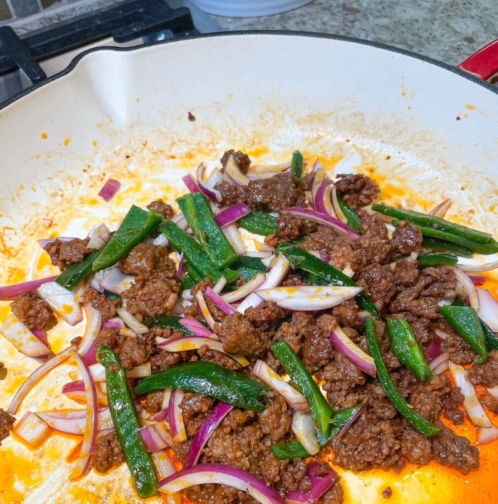 chorizon red onion and poblano in skillet