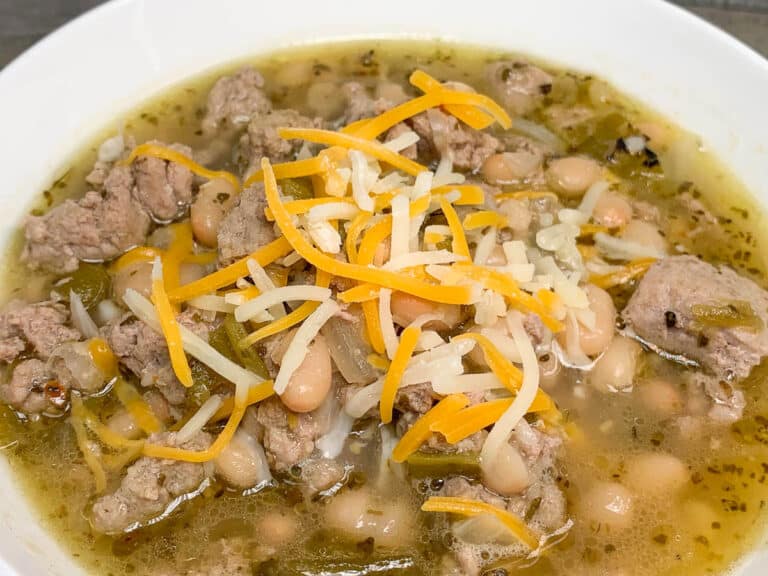 bowl of turkey chili with shredded cheese