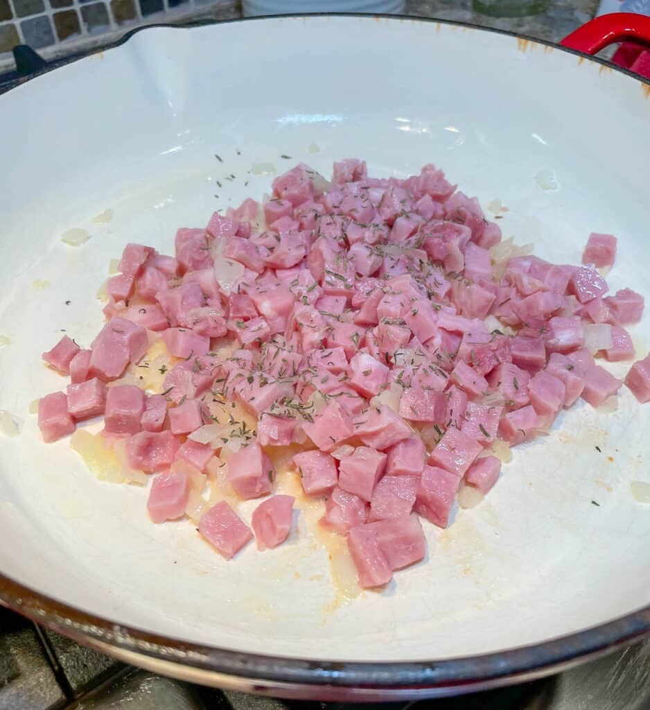 ham onions and thyme in skillet