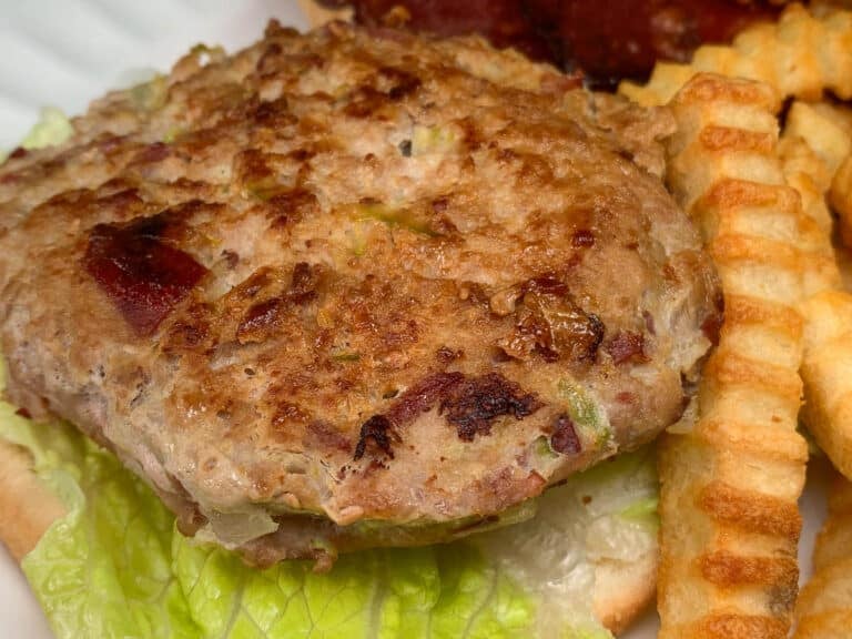 burger on a plate with fries