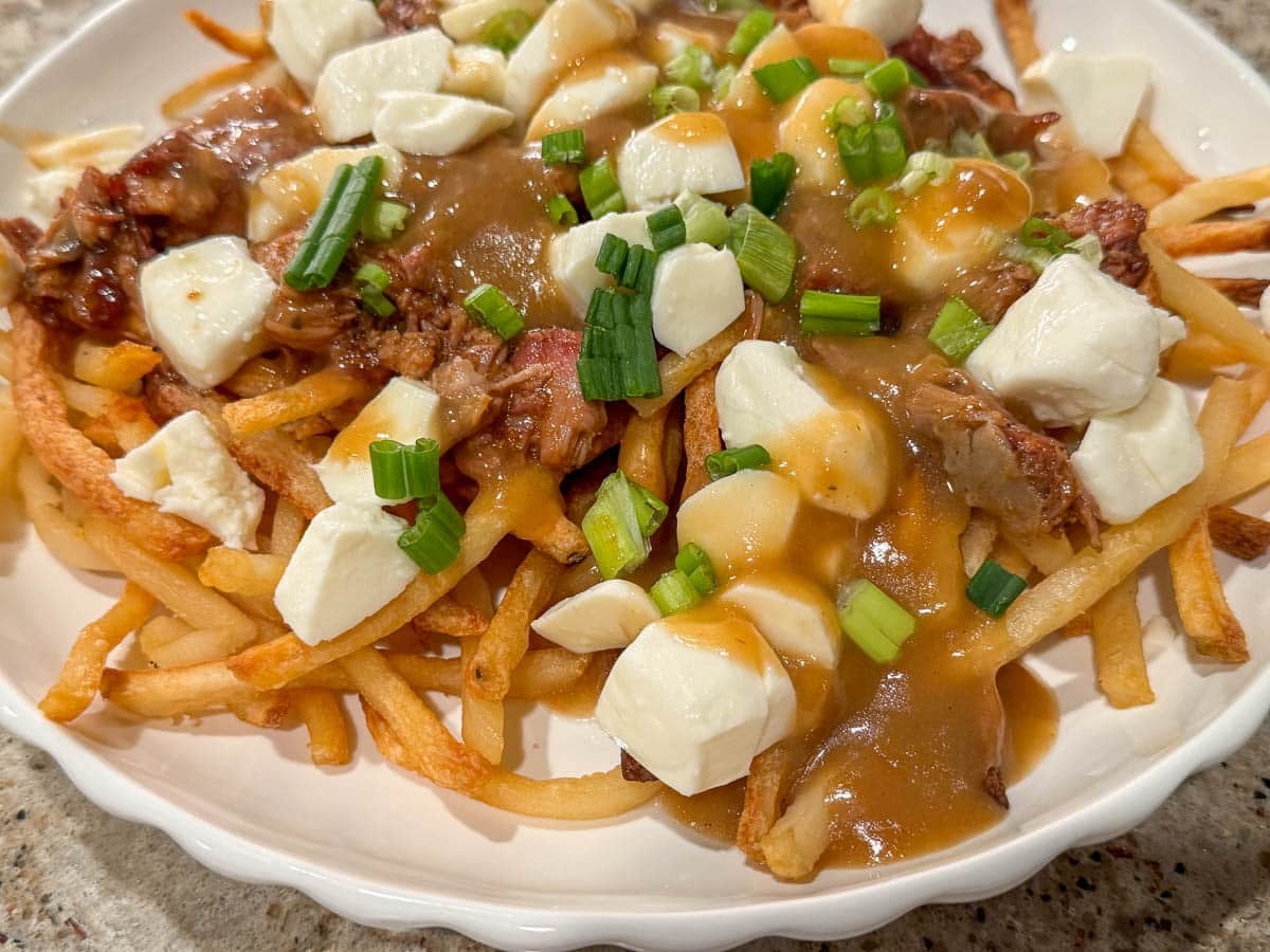 dish of bbq pulled pork poutine