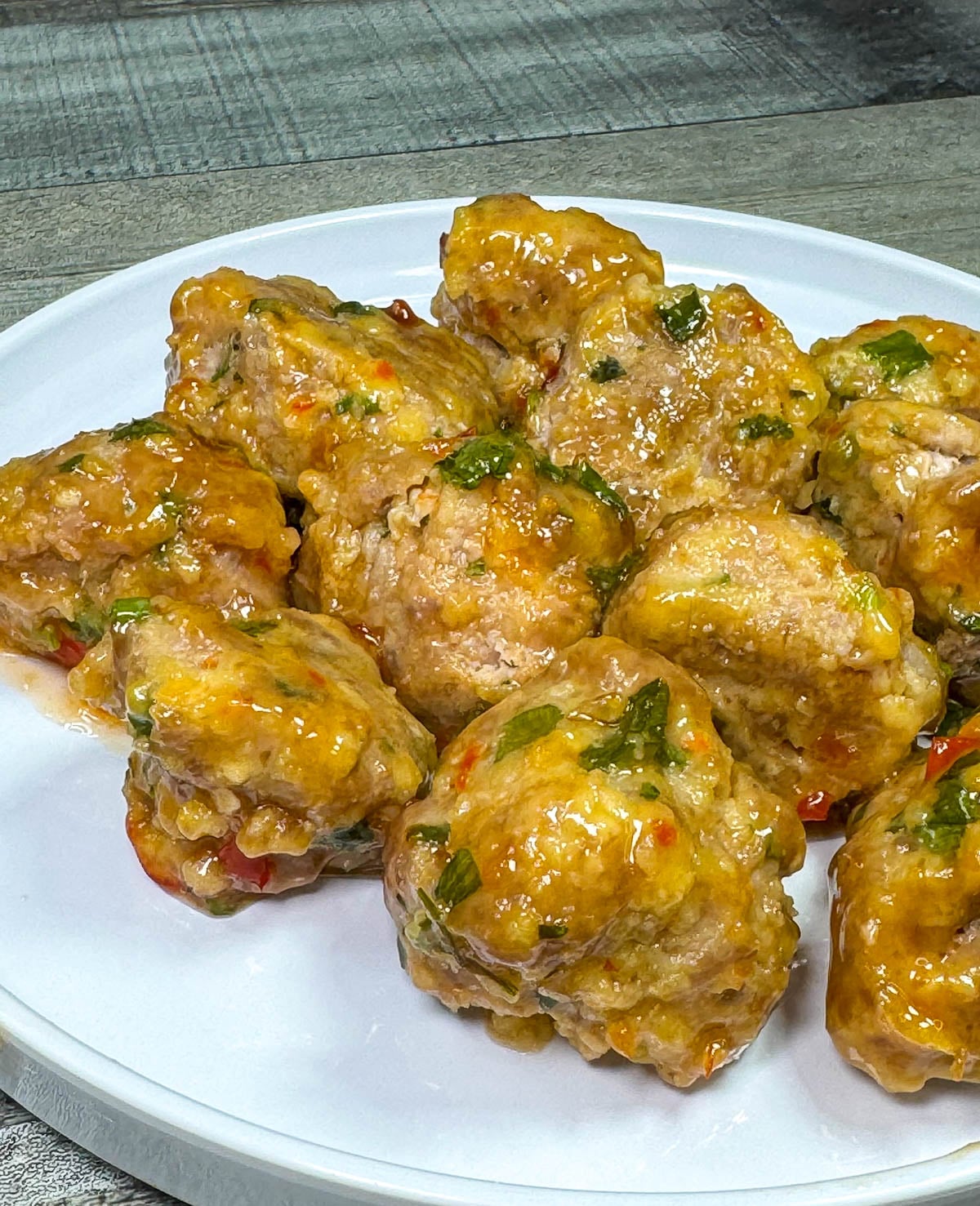 sweet chili meatballs on a plate